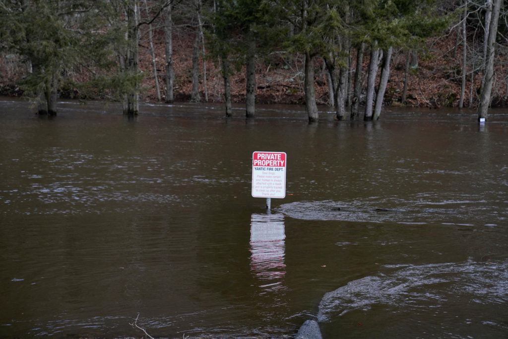 A parking lot is flooded at Fireman’s Field after heavy rains at the Fitchville Pond Dam on the Yantic River in Yantic, Connecticut, U.S., January 10, 2024. Photo by Michelle McLoughlin/REUTERS