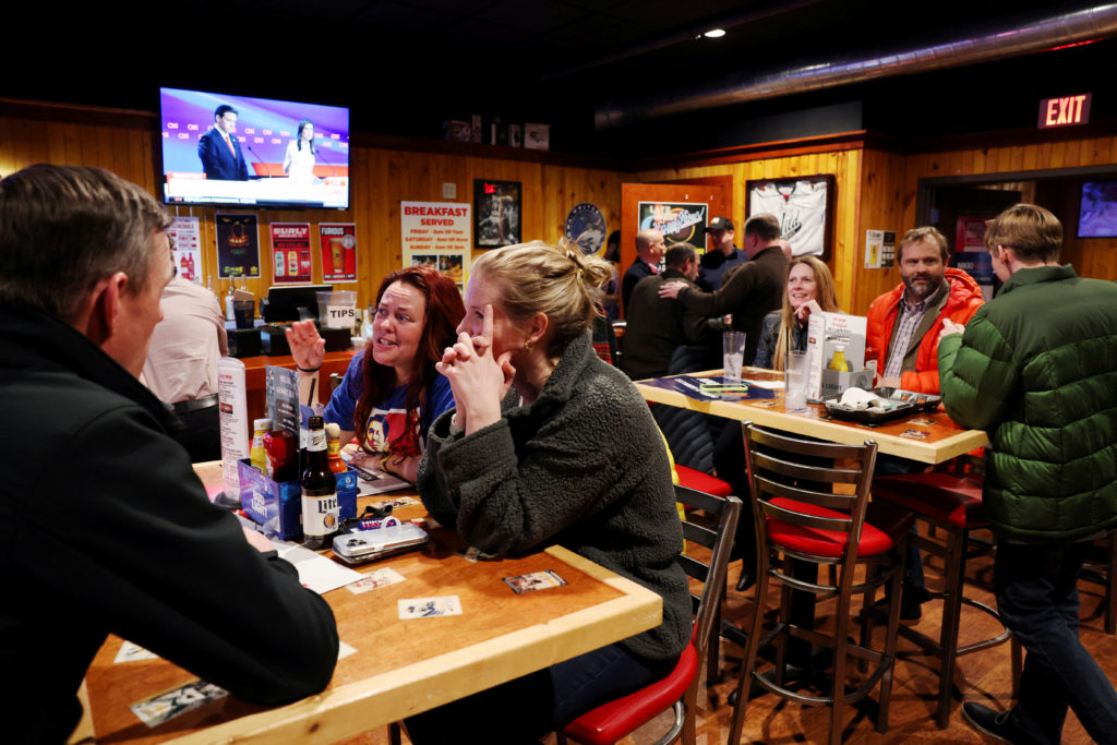 Supporters of Republican presidential candidate and former U.S. Ambassador to the United Nations Nikki Haley watch her deb...