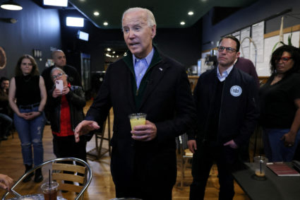 U.S. President Joe Biden answers questions from the press at Nowhere Coffee Co. in Emmaus, Pennsylvania, U.S., January 12, 2024. Photo by Leah Millis/REUTERS