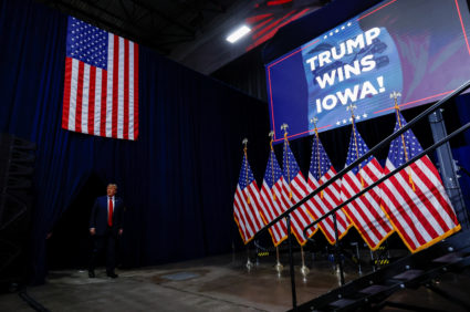 Republican presidential candidate and former U.S. President Donald Trump walks towards the stage during his Iowa caucus night watch party in Des Moines, Iowa, U.S., January 15, 2024. Photo by Evelyn Hockstein/REUTERS