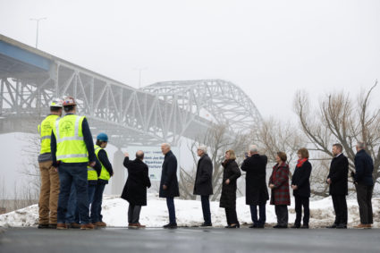 U.S. President Joe Biden listens to remarks by Wisconsin Secretary of the Department of Transportation Craig Thompson while surveying the John A. Blatnik Bridge in Superior, Wisconsin, U.S., January 25, 2024. Photo by Tom Brenner/REUTERS