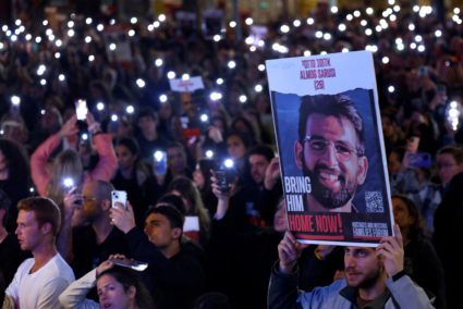 People rally calling for the release of hostages, in Tel Aviv
