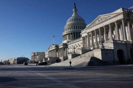 A person walks past the Senate side of the U.S. Capitol building in Washington