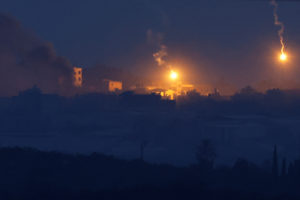 Flares fall over Gaza as seen from Sderot