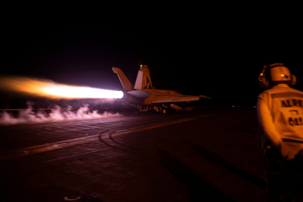 A fighter jet is launched from the U.S. Navy aircraft carrier USS Dwight D. Eisenhower against what they describe as Houth...