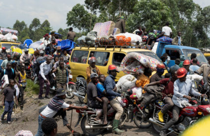 Congolese people carry their belongings as they flee from their villages around Sake in Masisi territory, following clashes between M23 rebels and the Armed Forces of the Democratic Republic of the Congo (FARDC); towards Goma, North Kivu province of the Democratic Republic of Congo February 7, 2024. Photo by Arlette Bashizi/Reuters