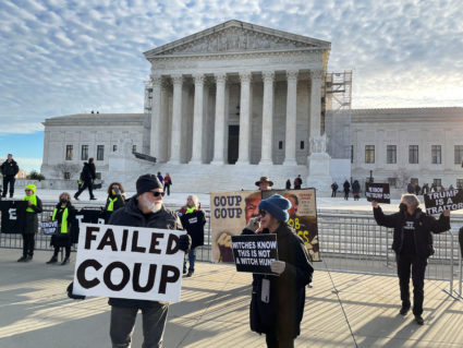 Demonstrators gather outside U.S. Supreme Court ahead of arguments in Trump appeal of Colorado ballot disqualification, in...