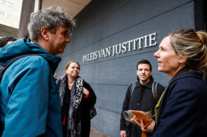 Lawyer Liesbeth Zegveld, her partner and Rolien Sasse, director of PAX stand outside of the court building as Dutch appeals court rule in case of human rights groups who seek to block the Dutch government from exporting F-35 fighter jet parts to Israel, which they claim enables war crimes in the besieged Gaza Strip, in The Hague, Netherlands, February 12, 2024. Photo by Piroschka van de Wouw/Reuters