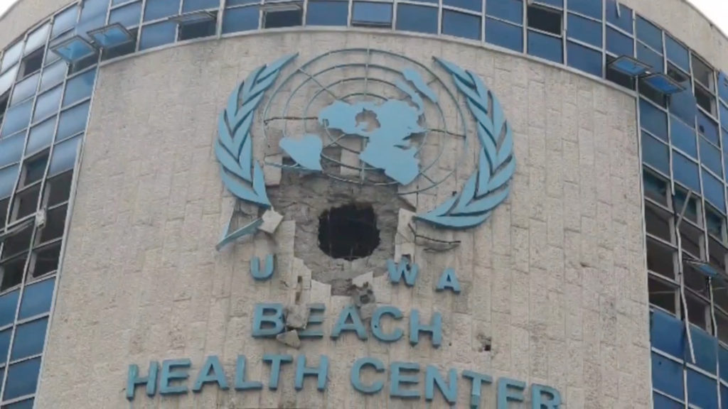 A view of the damaged exterior of a UNRWA health centre, amid the ongoing conflict between Israel and the Palestinian Islamist group Hamas, in Gaza, in this still image taken from video released February 15, 2024. Photo provided by UNRWA/Handout via REUTERS