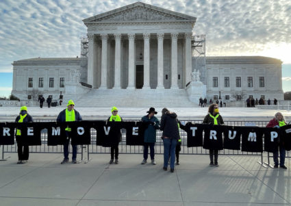 Demonstrators gather outside U.S. Supreme Court ahead of arguments in Trump appeal of Colorado ballot disqualification, in...