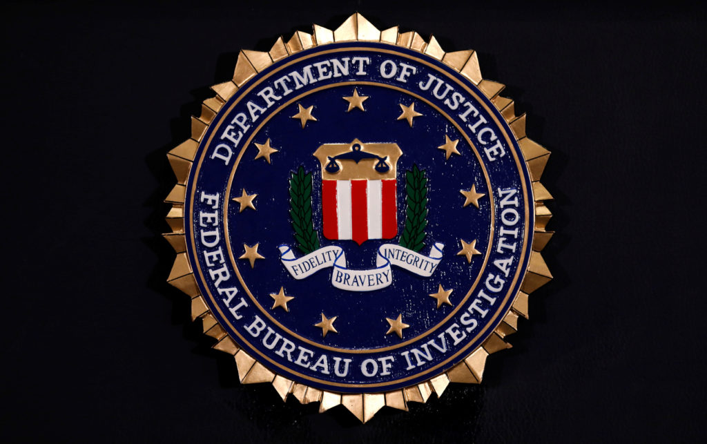 The Federal Bureau of Investigation seal is seen at FBI headquarters before a news conference by the FBI Director on the i...