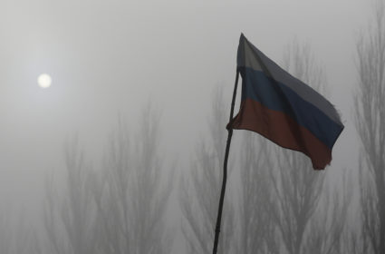 The Russian flag is pictured at the checkpoint outside of the town of Gorlovka northeast of Donetsk