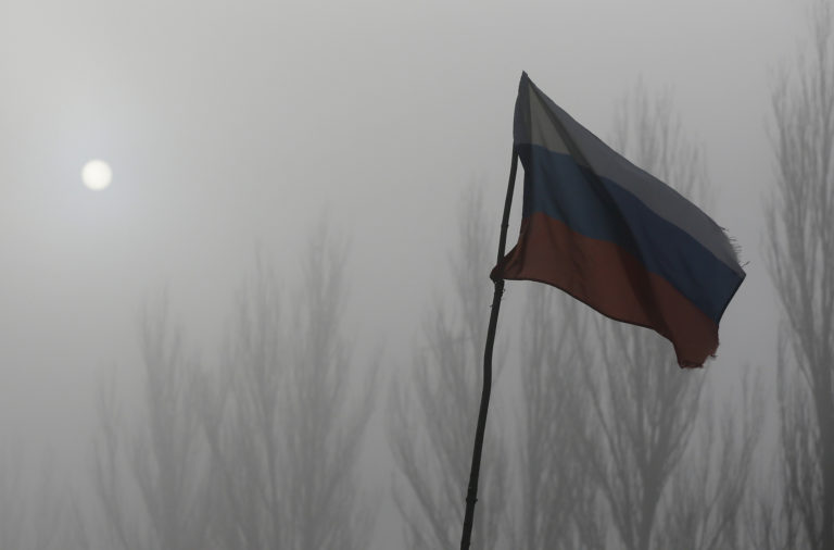 The Russian flag is pictured at the checkpoint outside of the town of Gorlovka northeast of Donetsk