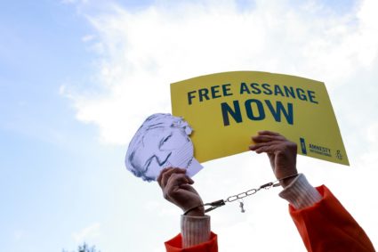 Julian Assange's supporters demonstrate in front of the British Embassy in Rome