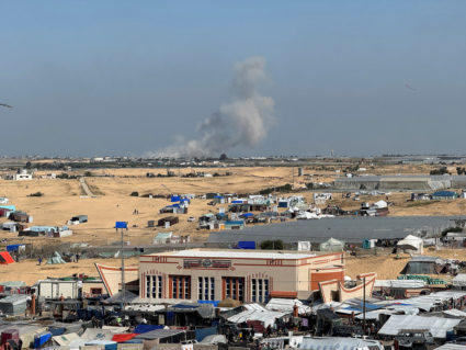 Smoke rises during an Israeli ground operation in Khan Younis, as seen from a tent camp sheltering displaced Palestinians ...
