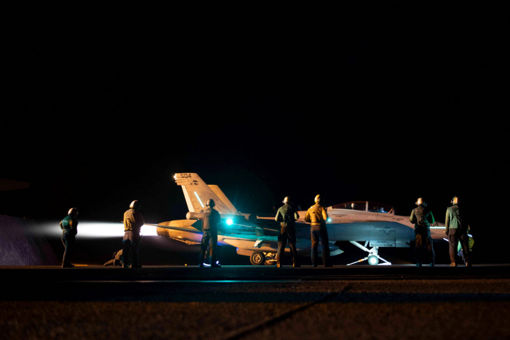 A fighter jet is launched from the U.S. Navy aircraft carrier USS Dwight D. Eisenhower against what they describe as Houth...