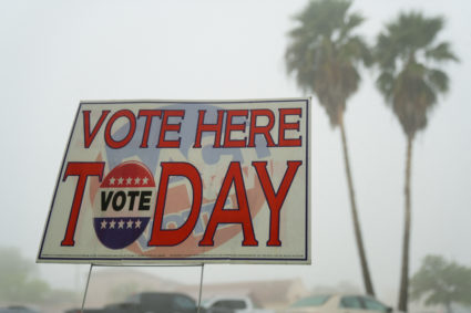 A sign directing people to a polling location is seen during the Super Tuesday primary election in Rio Grande City, Texas, U.S., March 5, 2024. Photo by Cheney Orr/Reuters