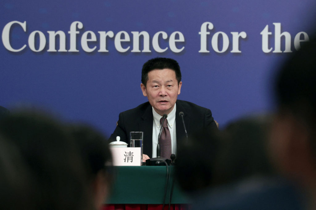 China Securities Regulatory Commission (CSRC) Chairman Wu Qing attends a press conference on the sidelines of the National...