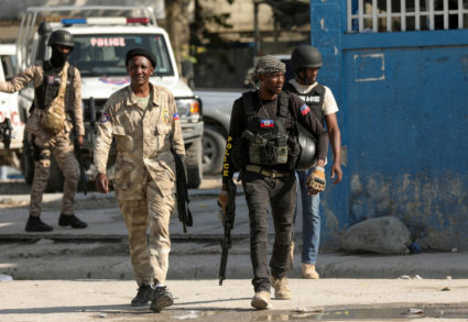 FILE PHOTO: Police officers patrol outside the police headquarters as Haiti continues in a state of emergency, in Port-au-Prince, Haiti March 6, 2024. Photo by Ralph Tedy Erol/Reuters