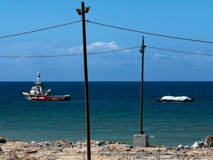 Open Arms rescue vessel tows a World Central Kitchen (WCK) barge loaded with food towards Gaza, where there is risk of famine after five months of Israel's military campaign, in this handout image released March 15, 2024. Photo by Israel Defense Forces/Handout via REUTERS