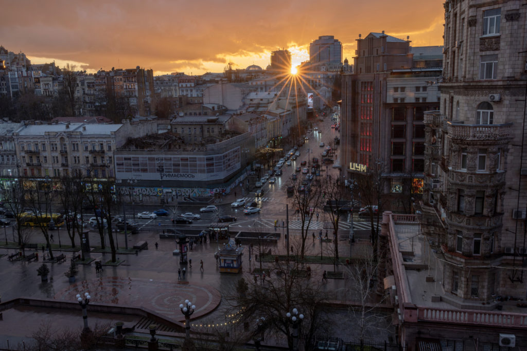 The evening sun sets over the skyline near Khreshchatyk Street in Kyiv, amid Russia’s attack on Ukraine, March 29, 2024. P...