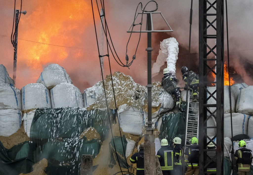 Firefighters work following Russia's missiles strike outside Kharkiv