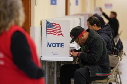 Voters cast their ballots during early voting at San Francisco City Hall