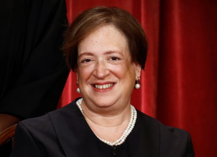 U.S. Supreme Court justices pose for their group portrait at the Supreme Court in Washington