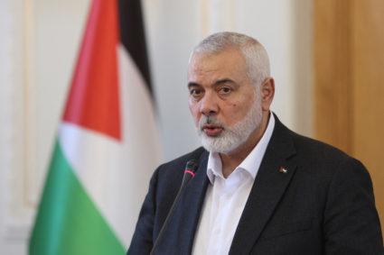 Palestinian group Hamas' top leader, Ismail Haniyeh and Iran's Foreign Minister Hossein Amir Abdollahian attend a press co...