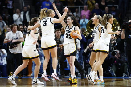 Iowa Hawkeyes guard Caitlin Clark (22) celebrates teammates after defeating the LSU Lady Tigers in the finals of the Albany Regional in the 2024 NCAA Tournament at MVP Arena on April 1, 2024 in Albany, New York. Photo by Winslow Townson-USA TODAY Sports