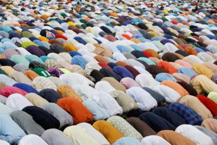 Muslim faithful attend the Eid al-Fitr prayers, marking the end of Ramadan, in Lagos, Nigeria