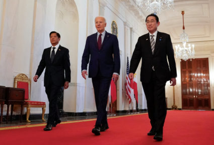 U.S. President Joe Biden escorts Philippines President Ferdinand Marcos Jr. and Japan Prime Minister Fumio Kishida to their trilateral summit at the White House in Washington, U.S., April 11, 2024. Photo by Kevin Lamarque/Reuters