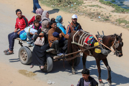 Palestinians, who were displaced by Israel's military offensive on south Gaza, attempt to return to their homes in north G...
