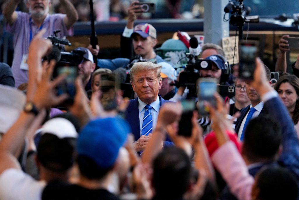 FILE PHOTO: Republican presidential candidate and former U.S. President Donald Trump, in the Harlem section of New York