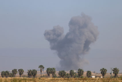 An Israeli tank manoeuvres near the Israel-Gaza border