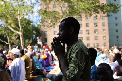 FILE PHOTO: Muslims participate in an outdoor prayer event at Masjid Aqsa-Salam mosque, Manhattan's oldest West African mosque, to mark the end of Ramadan on June 15, 2018 in New York City. Photo by Spencer Platt/Getty Images