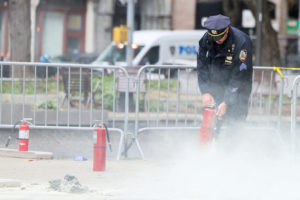 Aftermath of a person covered in flames outside NY courthouse of former U.S. President Trump's criminal hush money trial