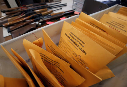 Firearms evidence envelopes containing the guns turned in from the public as part of the "Gun Turn-in" event where a gift ...