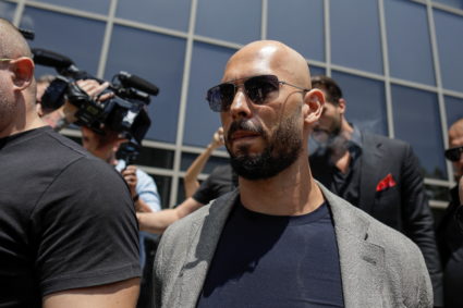 Andrew Tate, escorted by bodyguards, leaves the Bucharest Tribunal in Bucharest, Romania, June 21, 2023. Photo by Inquam Photos/Octav Ganea via REUTERS
