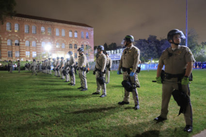 Police step in to separate fighting protesters at UCLA