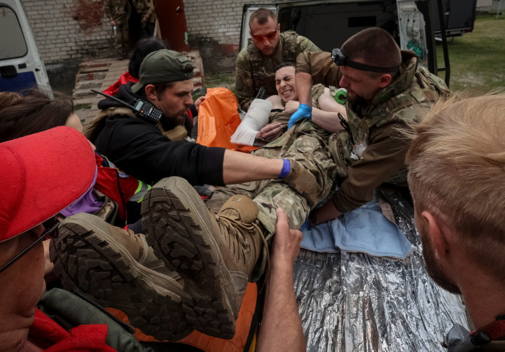 Heavy fighting rages along Ukraine's northeast front line as civilians flee Russian onslaught