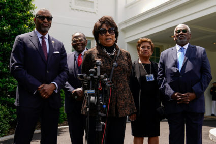 Cheryl Brown Henderson, daughter of Brown v. Board of Education named plaintiff Oliver Brown, speaks to reporters as President and CEO of the NAACP Derrick Johnson, Brown v. Board of Education plaintiff and veteran John Stokes and Nathaniel Briggs, son of Brown v. Board of Education named plaintiff Harry Briggs Jr., listen after the group met with U.S. President Joe Biden at the White House in Washington, U.S., May 16, 2024. Photo by Elizabeth Frantz/Reuters