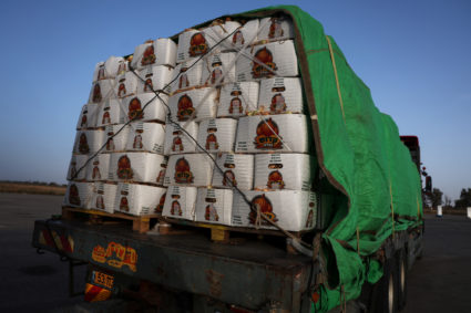 A food aid truck sits abandoned near the entrance to the Kerem Shalom border crossing, as military operations continue in ...