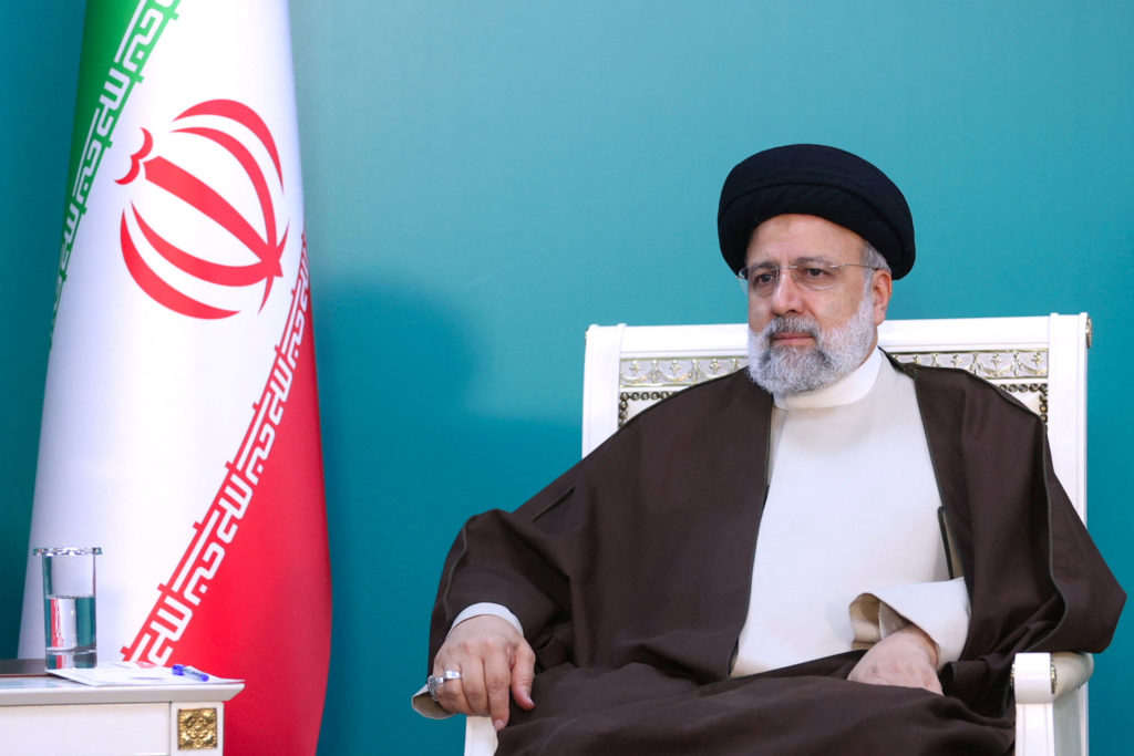 Iranian President Ebrahim Raisi attends a meeting with Azerbaijan's President Ilham Aliyev on the Azerbaijan-Iran border