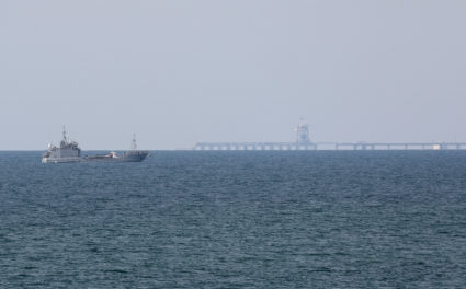 FILE PHOTO: A ship loaded with aid sails near a U.S.-built pier, as seen from central Gaza Strip