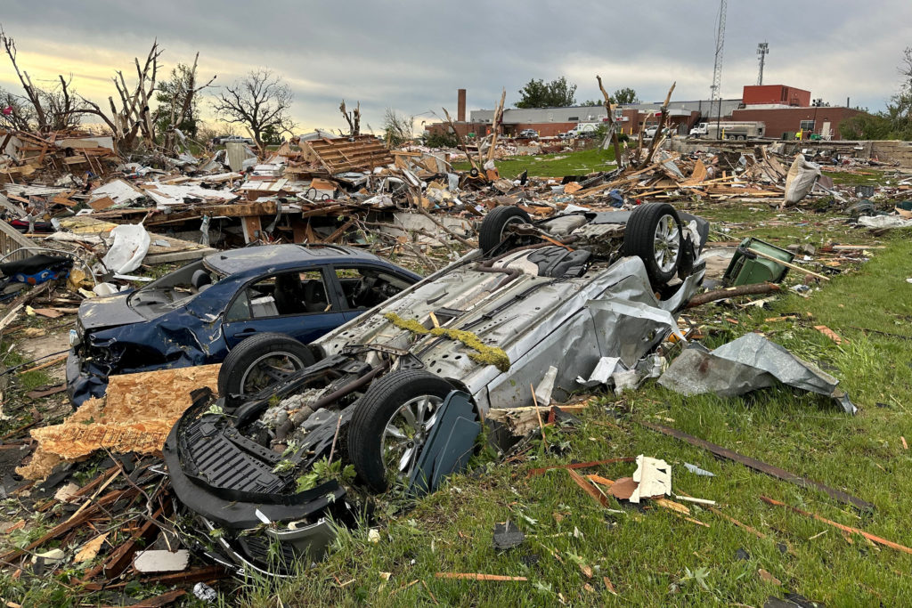 Damage is seen outside of the Adair County Health System hospital which was evacuated after a tornado struck the day prior...