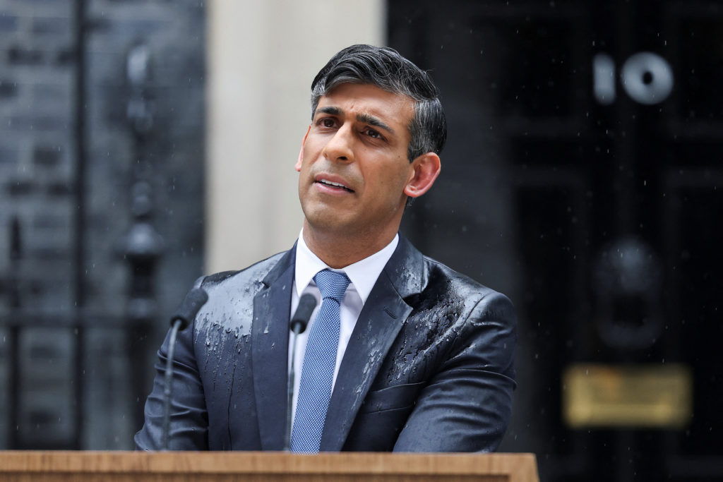 British Prime Minister Rishi Sunak delivers a speech calling for a general election, outside Number 10 Downing Street, in ...
