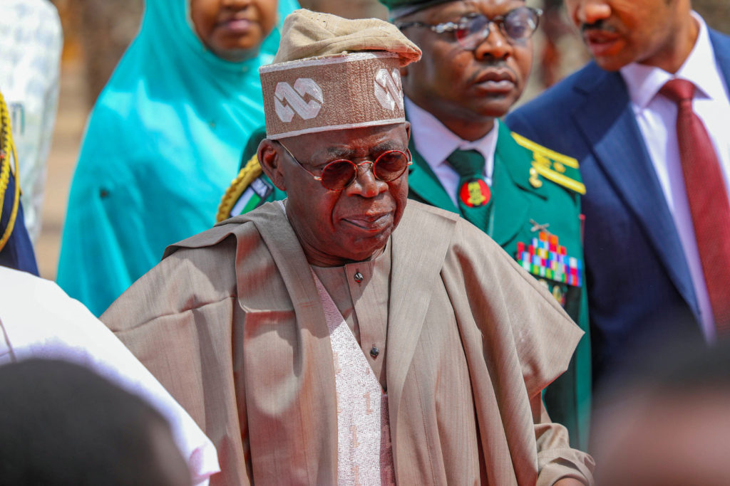 Nigeria's President Bola Tinubu walks to attend the inauguration ceremony of Chad's newly elected President and junta lead...
