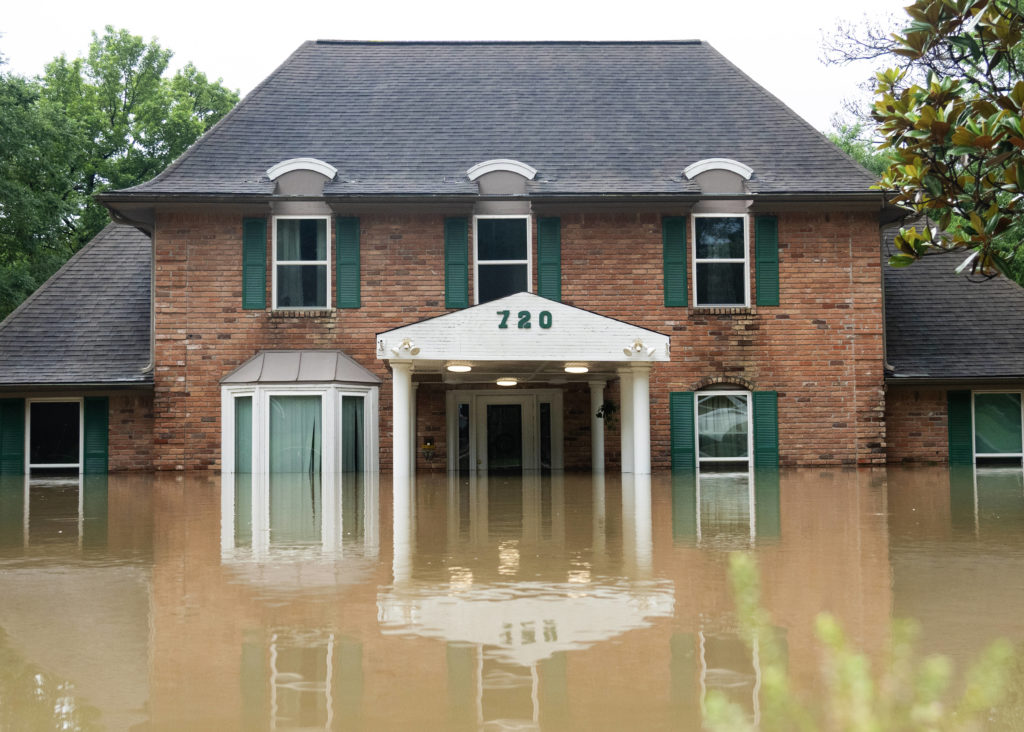 Houston's heavy rain eases, but high waters leave lengthy cleanup ahead