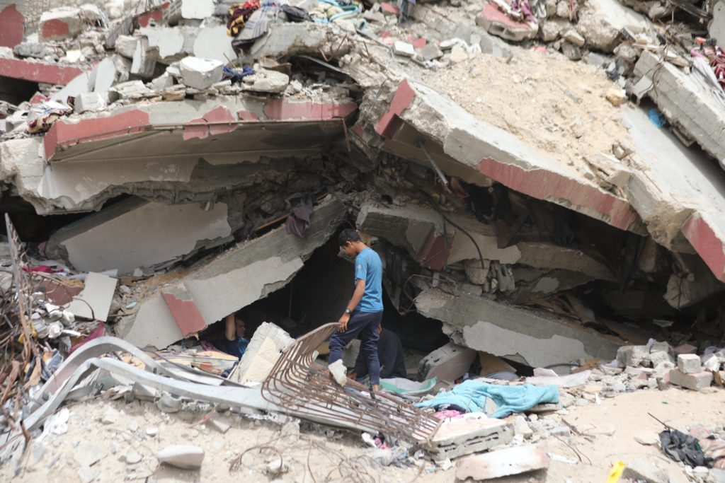 Palestinians, residing in the region, struggle with significant challenges amidst rubbles as they strive to navigate throu...